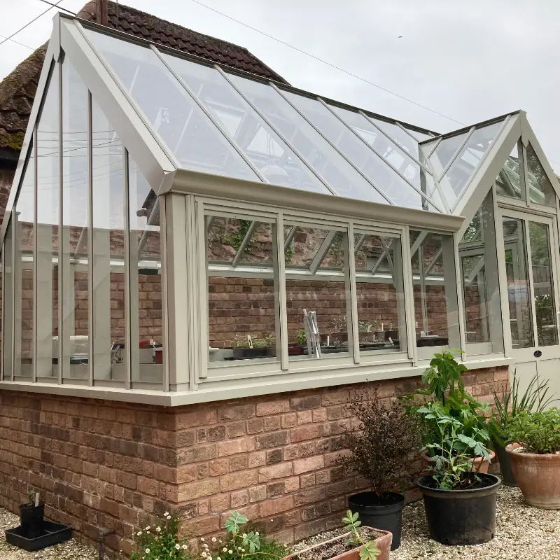 Brick base for Victorian-style greenhouse.